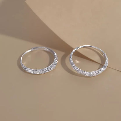 Piercing Circle Charm Hoop Earring